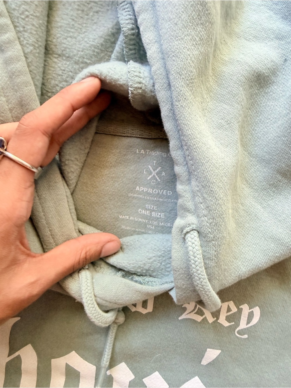 One Size LA Trading Co Light Blue Low Key Boujee Graphic Hoodie - Picture 3 of 5